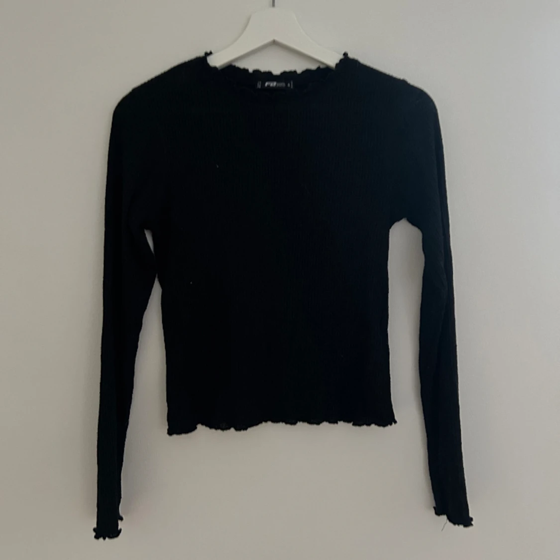 Svart långärmad tröja