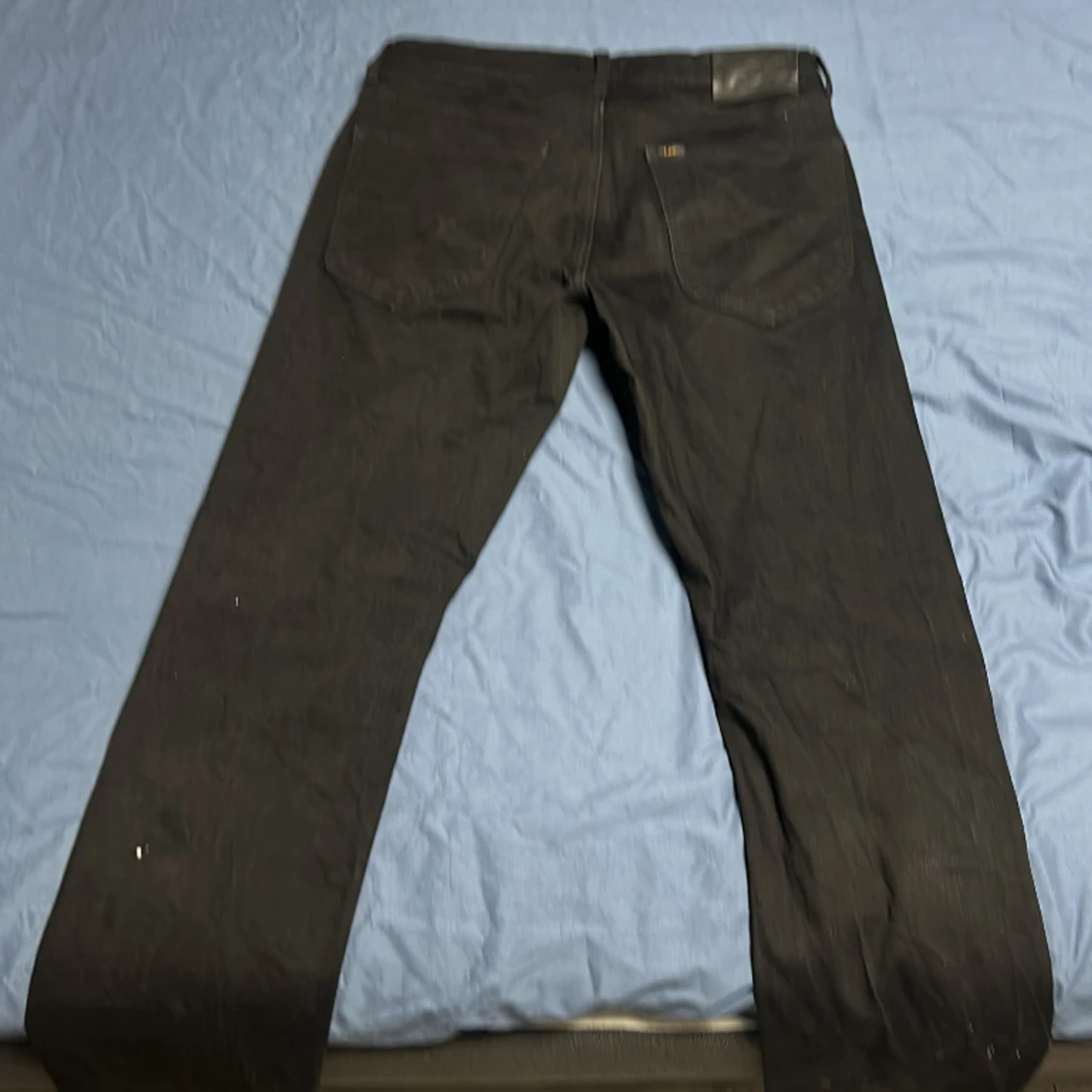 Svarta lee jeans - 90