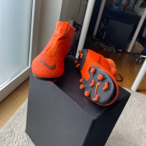 Football shoes - A unisex football shoes. It has only been worn once and it’s practically new. 