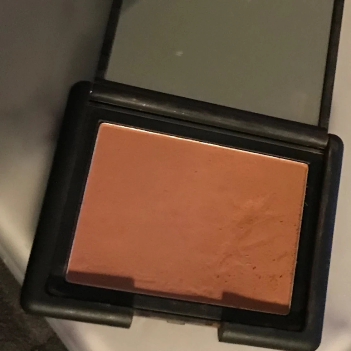 En blush från W7 - 91