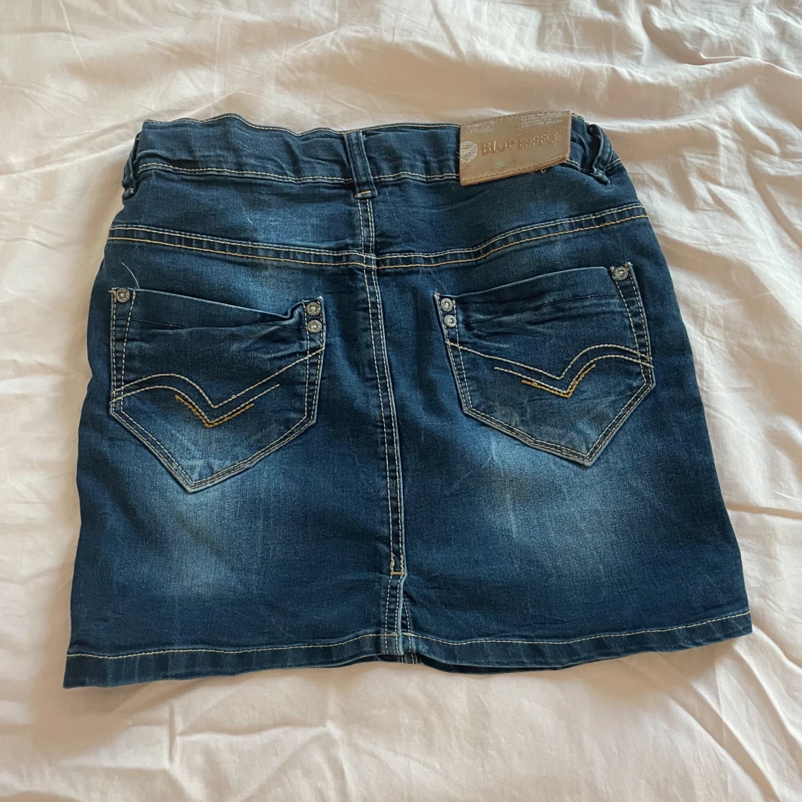 Lågmidjad jeanskjol - 90