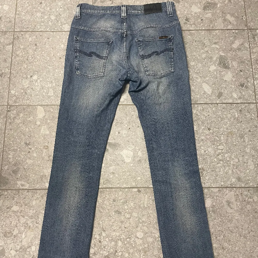 Säljer ett par Nudie jeans i storlek 30/32. Jeans & Byxor.