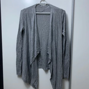 Kofta - Kofta i fint skick, sidorna är lite längre framme 