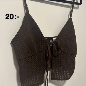 Linne - Brunt virkat linne man knyter i mitten. Aldrig använt