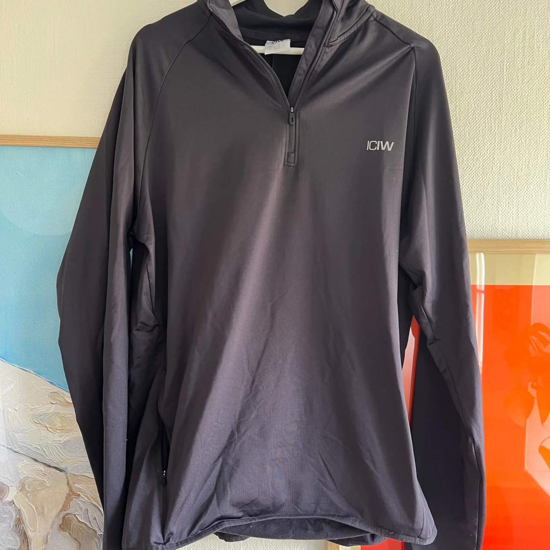 Svart långärmad träningströja med halv dragkedja från ICANIWILL