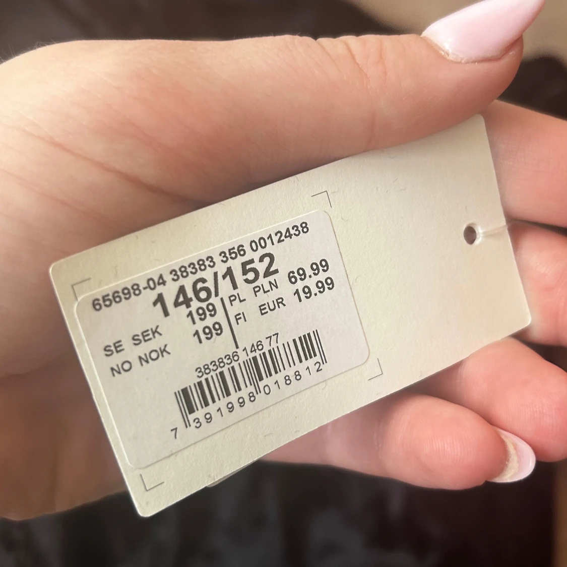 Svart sammetsliknande långärmad topp från Monday - 2