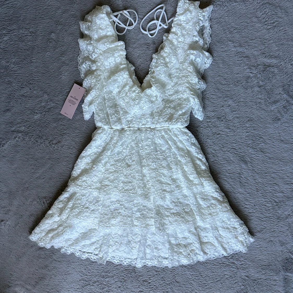 Vit spetsklänning från Nelly  - 1