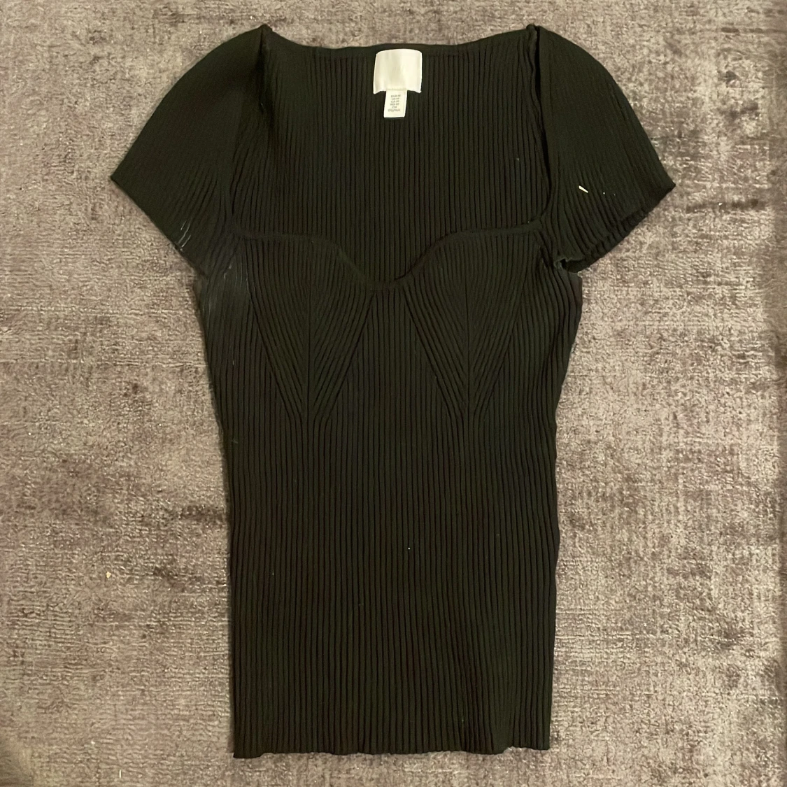 Svart ribbad topp från H&M