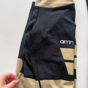 Tränings tights 2 st - Amin och ett par svarta båda för priset