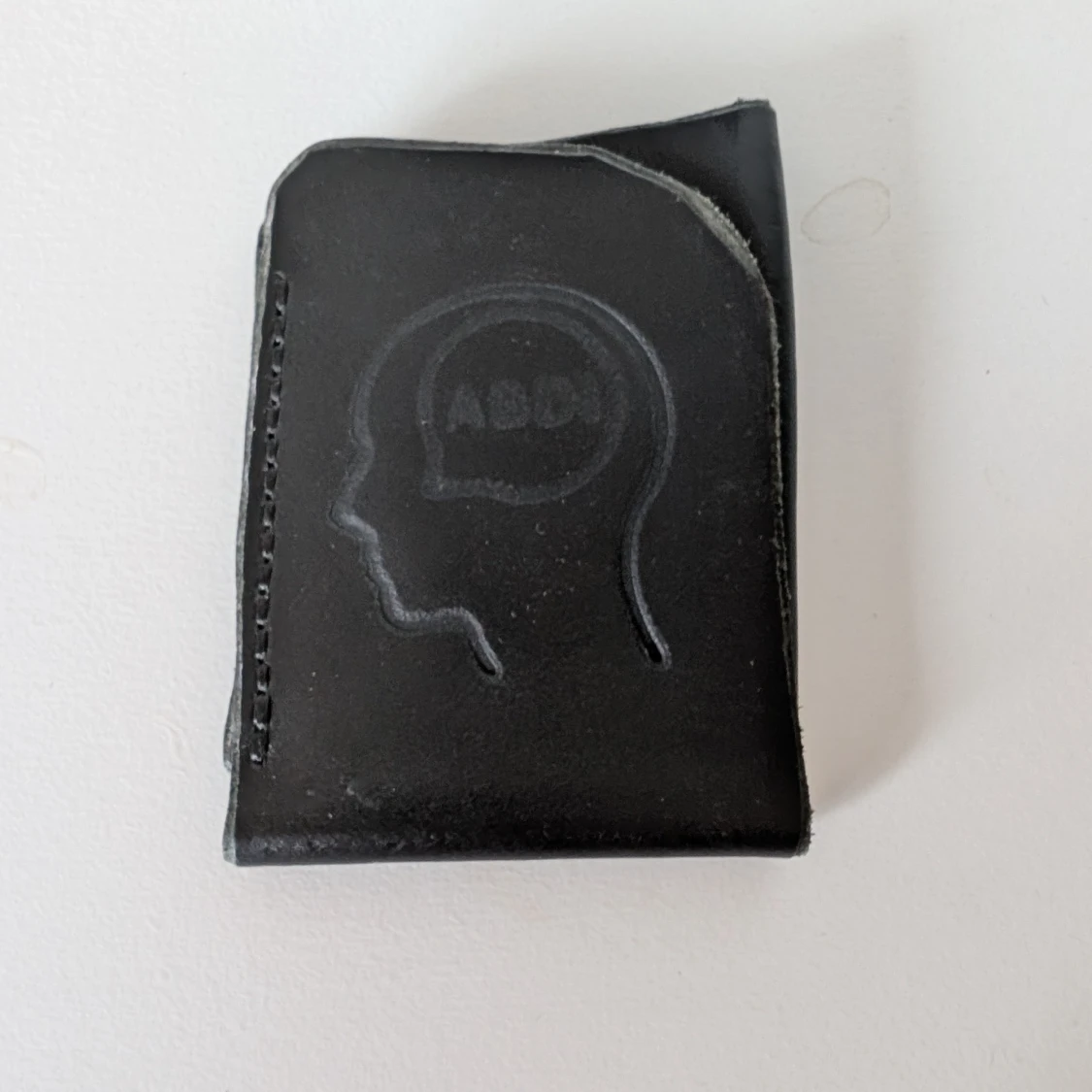 "Abdi" assymetrisk korthållare