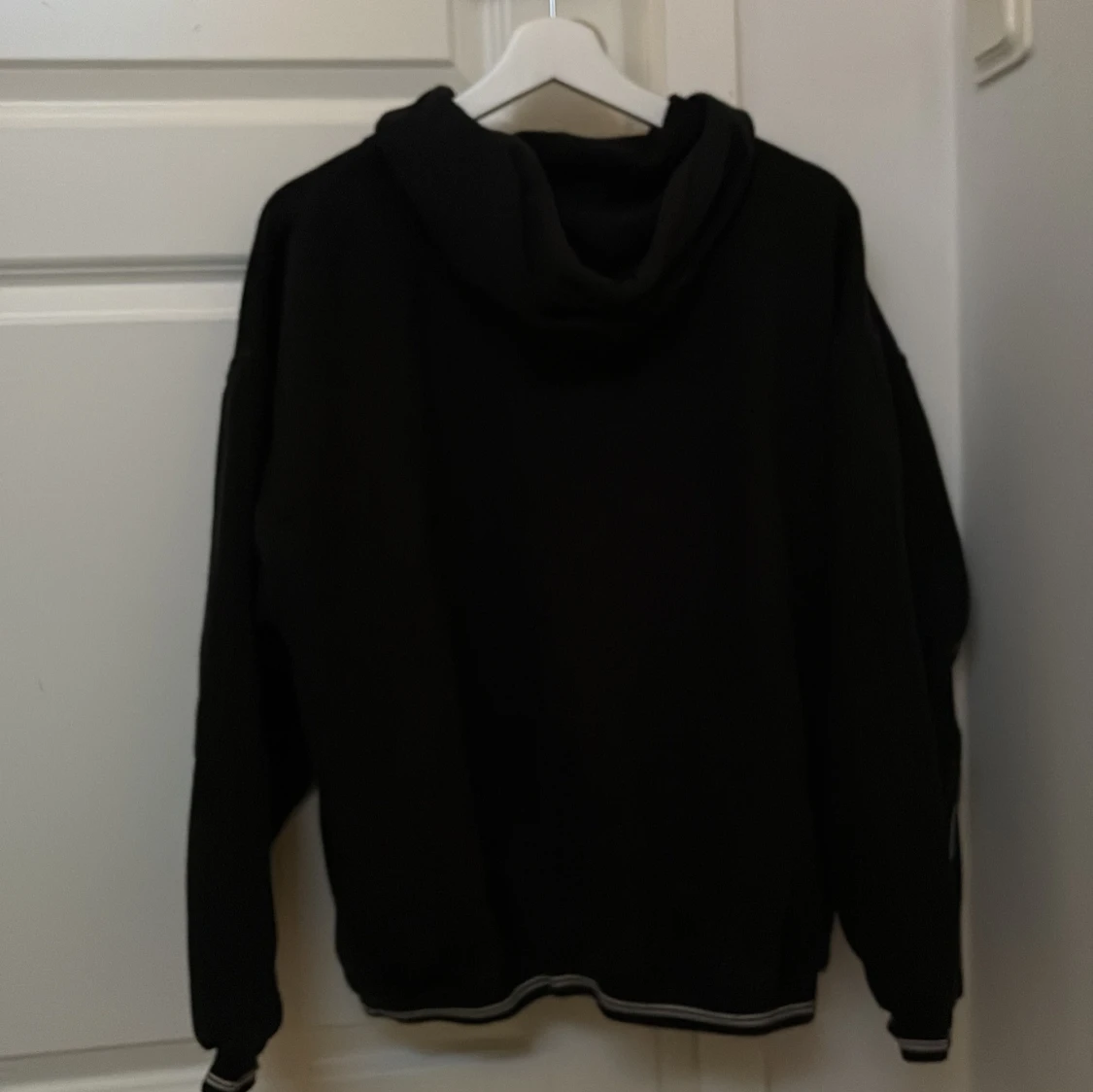 Svart hoodie från Umbro - 1