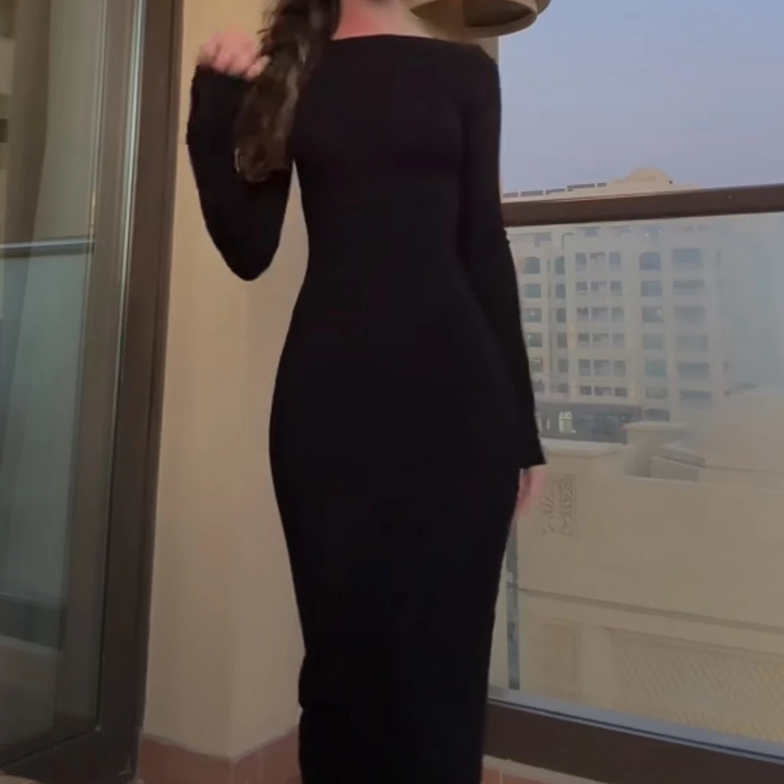 Svart långärmad skimsklänning