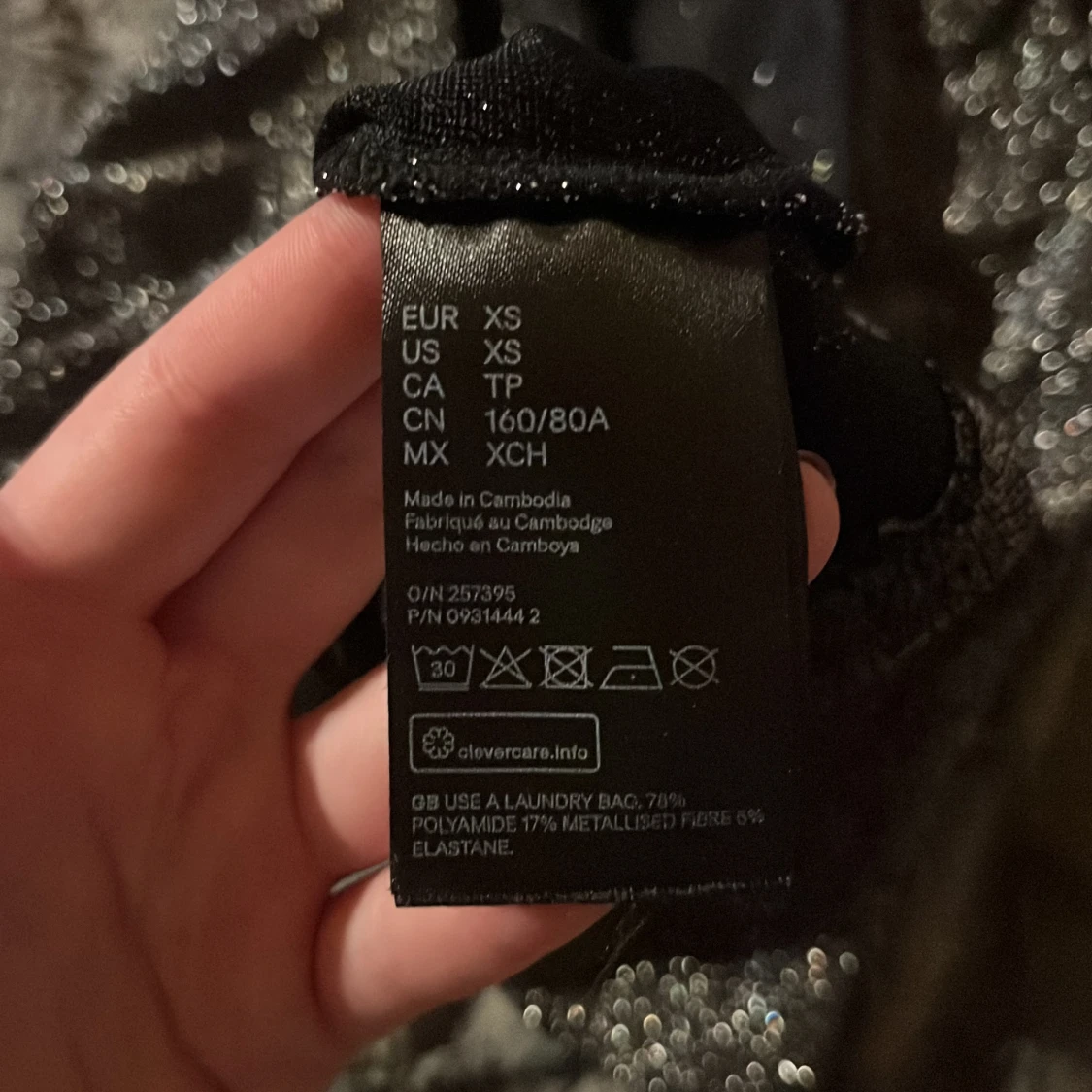 Glittrig svart långärmad topp - 2