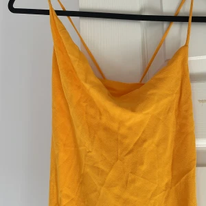 Orange långklänning  - Storlek XS