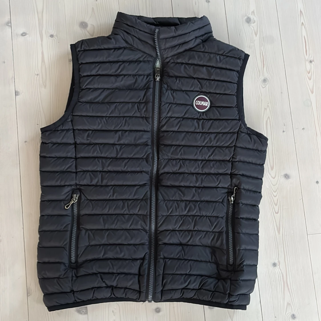 Svart dunväst från Colmar, stl 14Y