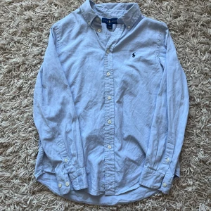 Ralph lauren skjorta (Ge prisförslag) - Säljer en snygg Ralph lauren skjorta | Storlek: S/18 | Skick: Mycket fint | Nypris: 1695kr | Mitt pris: Ge prisförslag! 