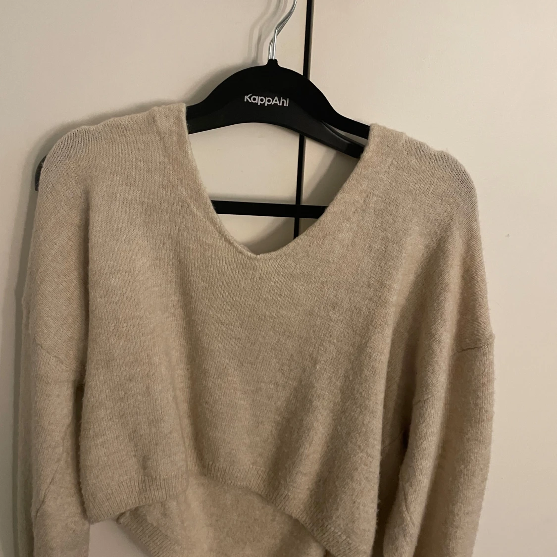 Beige stickad tröja från H&M