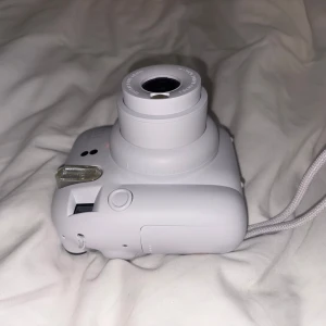 Instax mini 12 kamera  - Säljer min kamera! Använd en semester! Säljer för 400kr