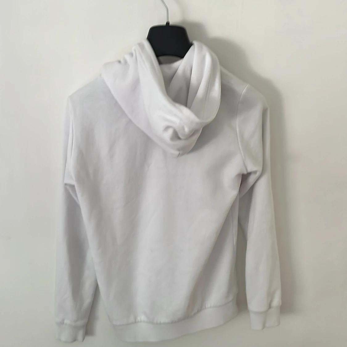 Vit hoodie från Peak Performance - 1