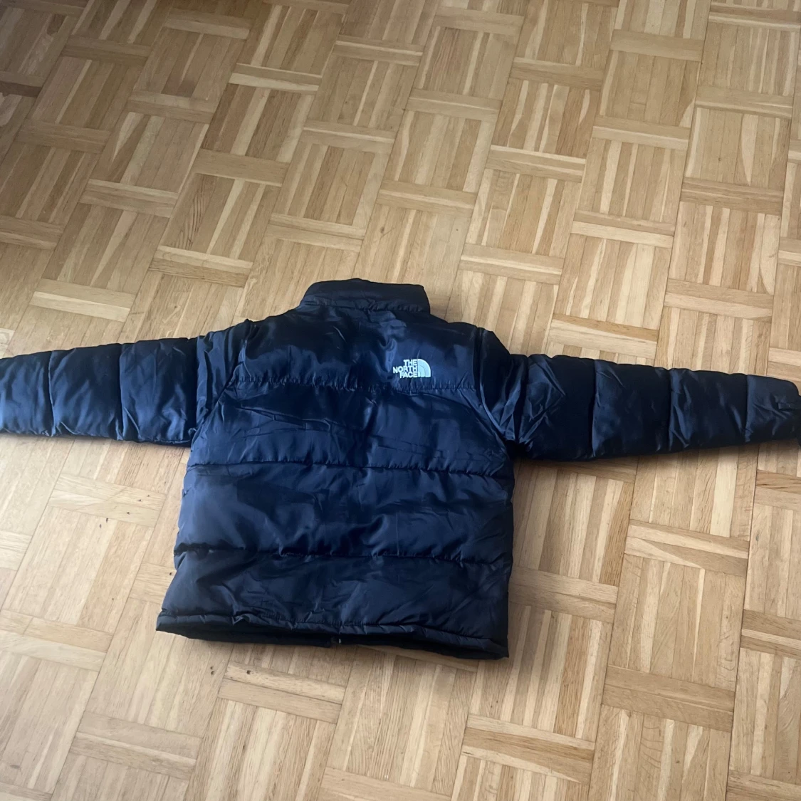 Svart dunjacka från The North Face - 2