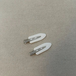 Hårspännen - Vita hårspännen man kan ha i håret tex när man sminkar sig, aldrig använda