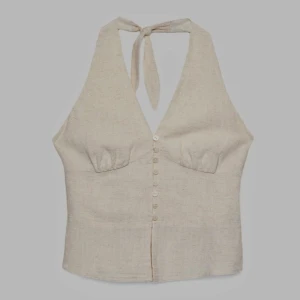 Beige halterneck topp - Super snygg men aldrig använd! Prislappen sitter kvar.❤️jag säljer då jag inte tycker att färgen passar mig… jag som vanligt har s tog L då det passade bättre i bysten❤️