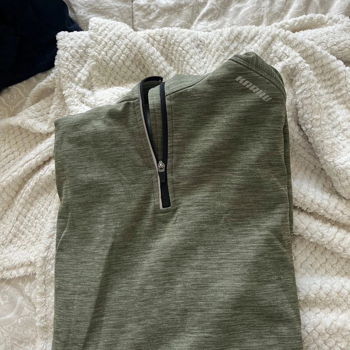 Grön half zip tröja från Karhu