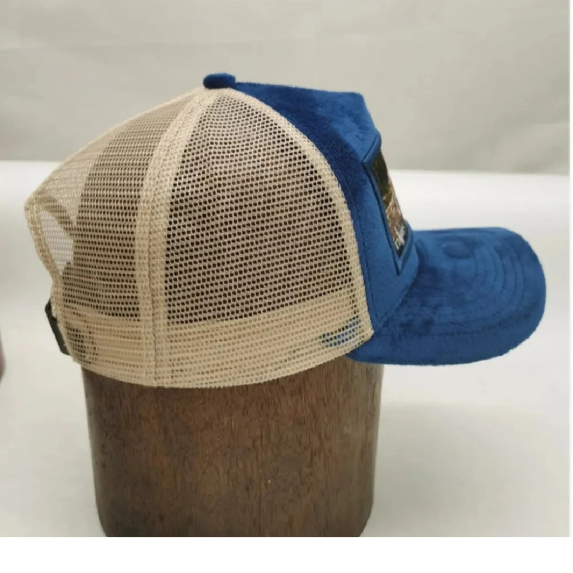 Blå och beige keps med bildmotiv - 1