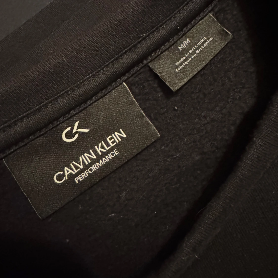 Svart långärmad tröja från Calvin Klein - 1