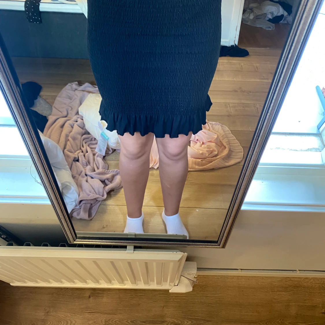 Svart kort kjol som funkar som tub topp - 2