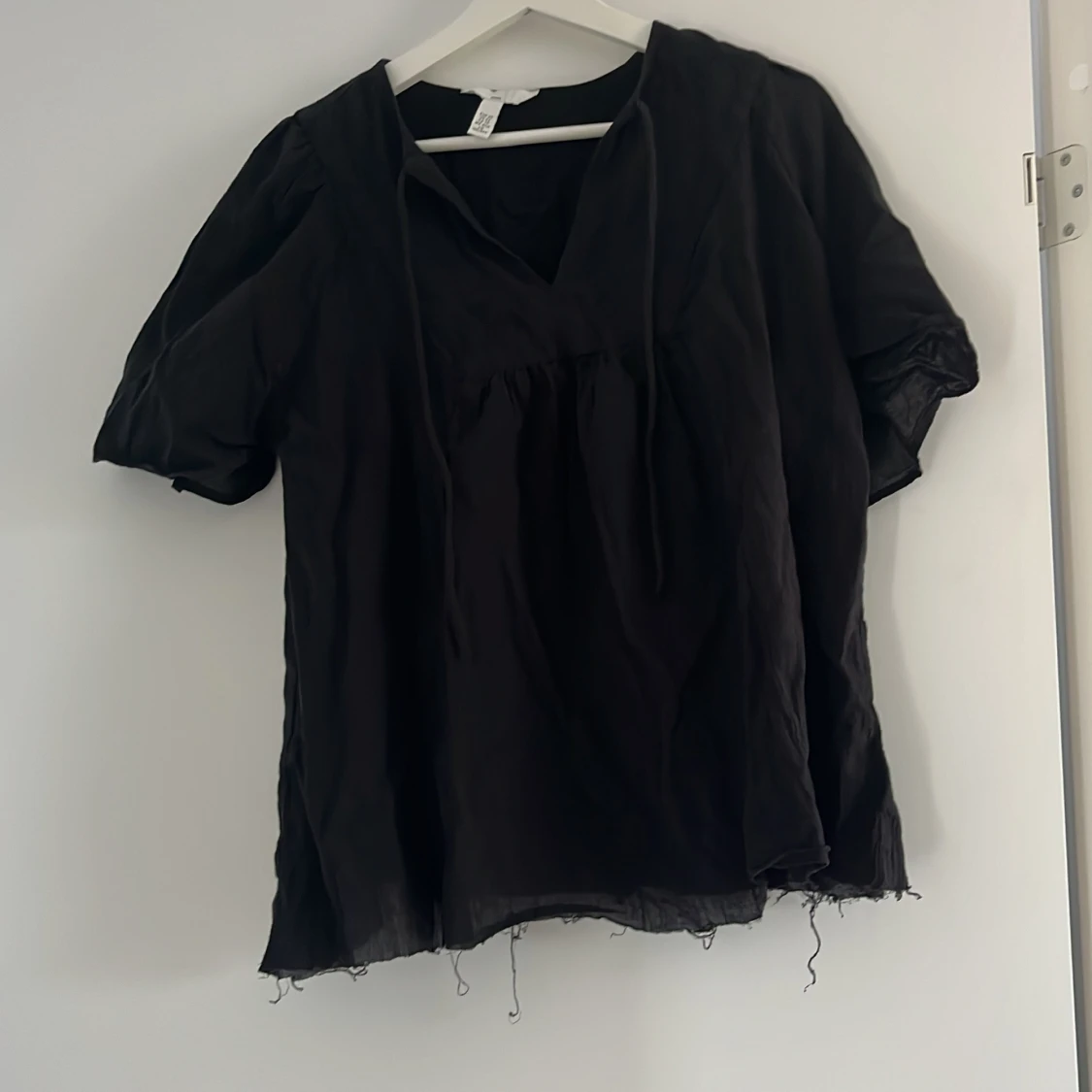 Svart blus från H&M Mama XS