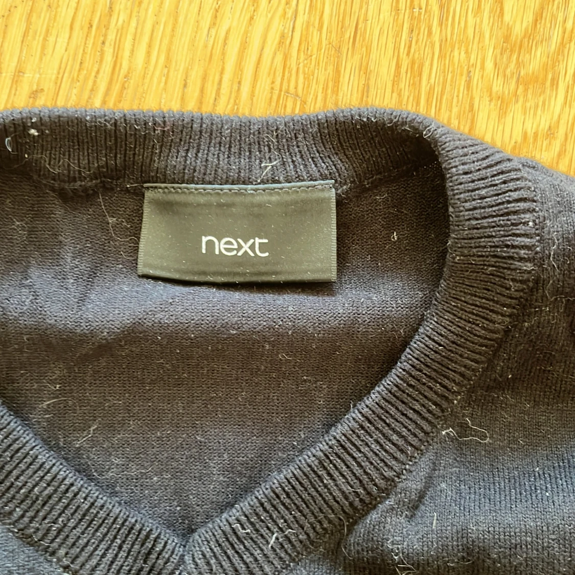 Svart stickad väst från Next - 1