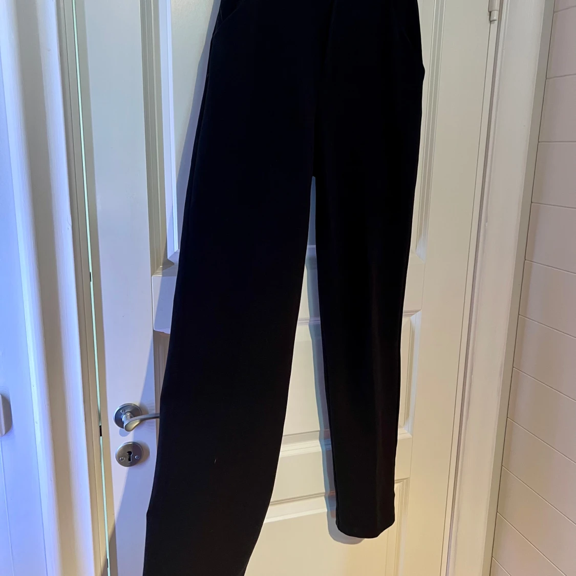 Svarta kostymbyxor