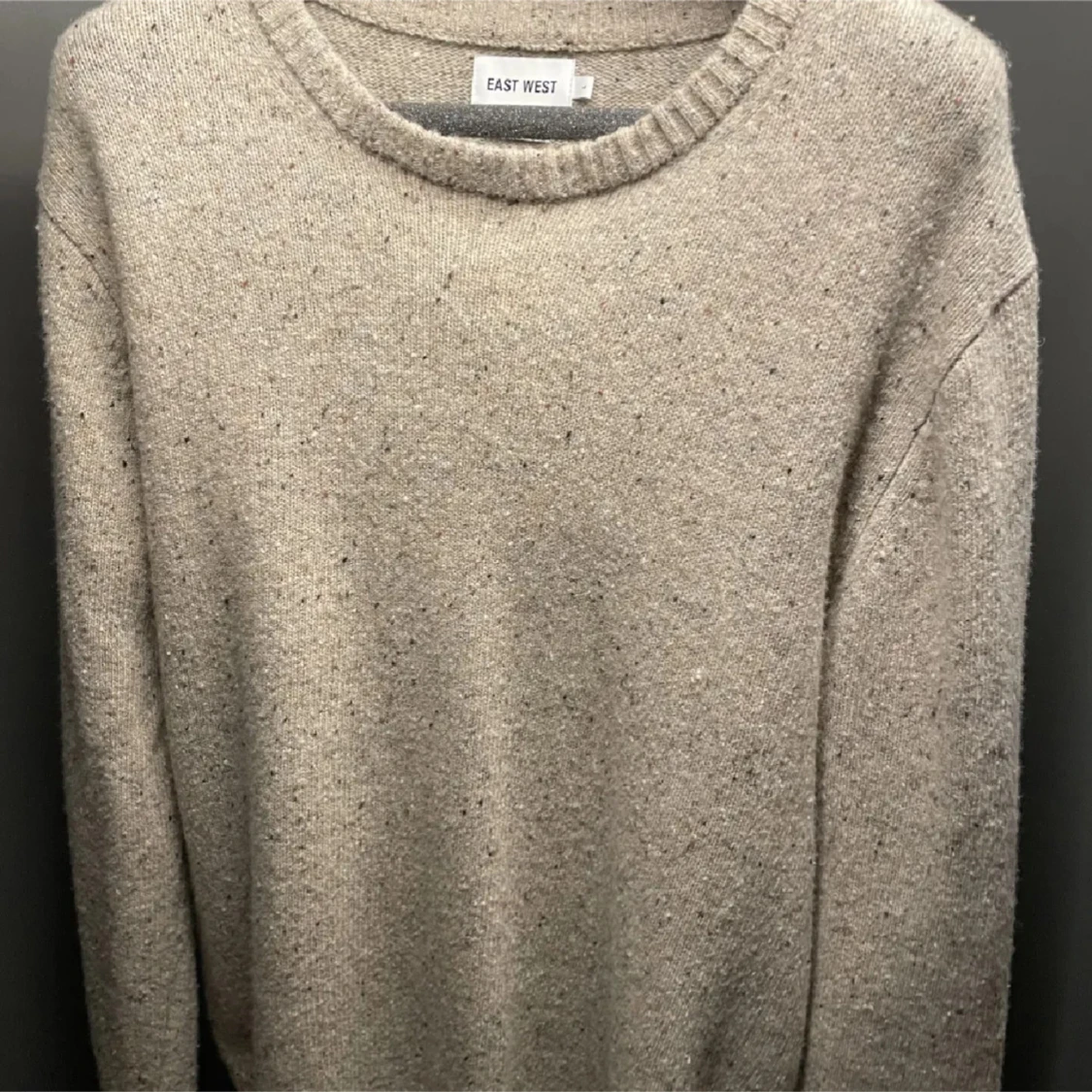 Beige stickad tröja från East West