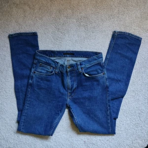 Nudie jeans lean dean - Säljer dessa nudie lean dean I mycket fint skick. Midja 29 längd 34. Skriv vid minsta fundering!