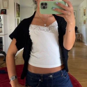  svart stickad bolero - Svart stickad bolero 