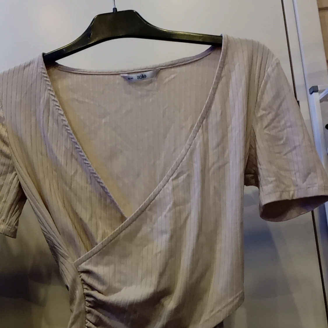 Beige omlottopp från ELOS