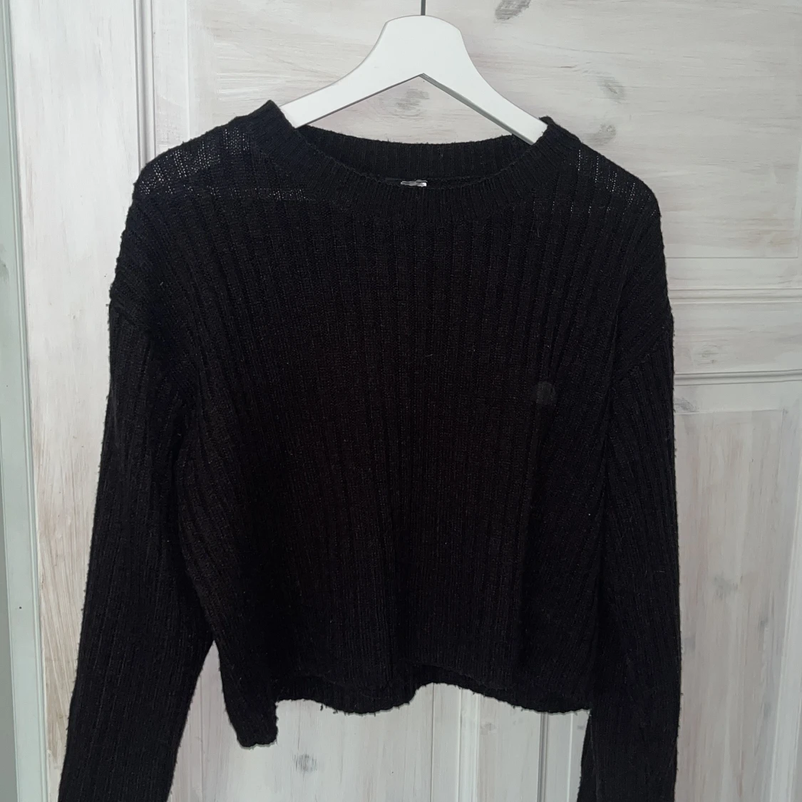 Svart ribbstickad tröja från h&m i storlek M