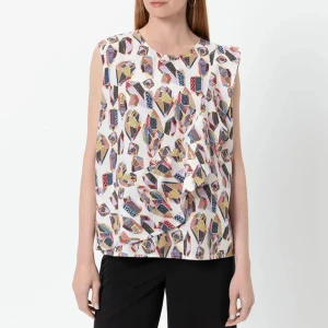 Färgglad ärmlös bomullsblus blus med grafiskt mönster - Säljer en luftig och cool ärmlös blus med grafiskt mönster i vitt, blått, rött, gult och svart. Toppen har en lös passform och ett unikt lager på lager-draperi framtill. Perfekt för dig som gillar färg och lekfull stil.