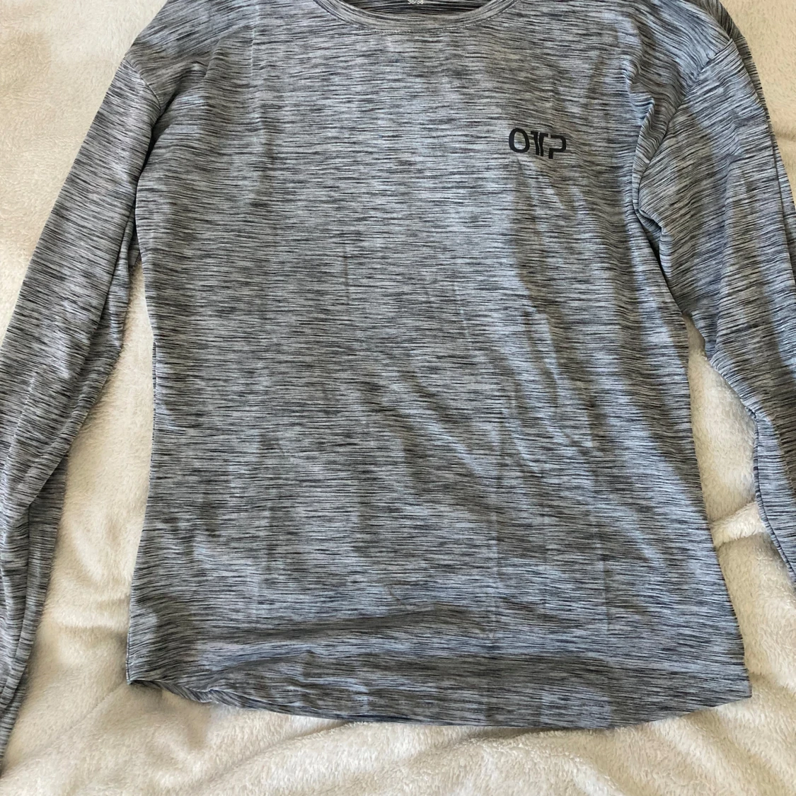 Gråmelerad långärmad tröja OTP