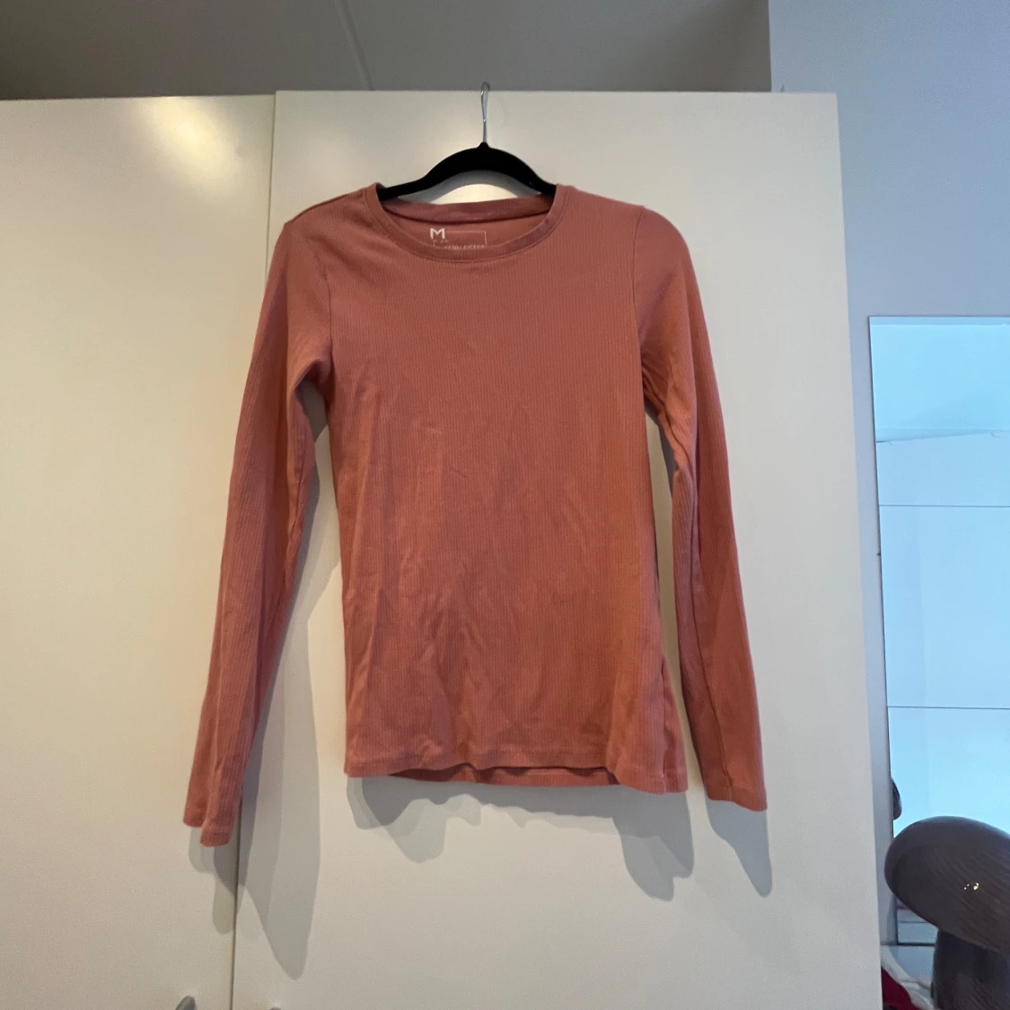 Rosa ribbad långärmad tröja