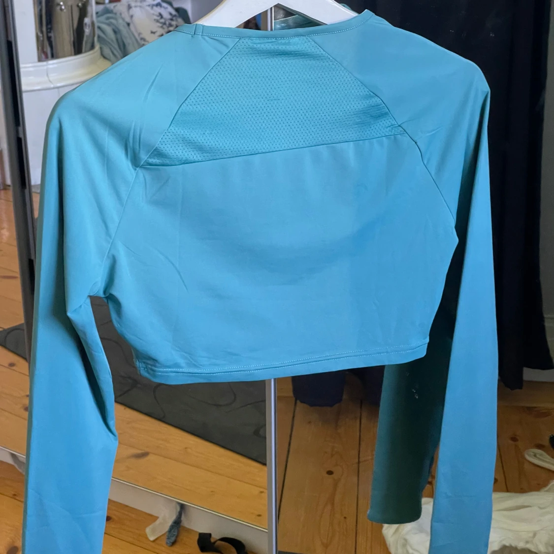 Turkos croppad långärmad träningströja från Gymshark - 1