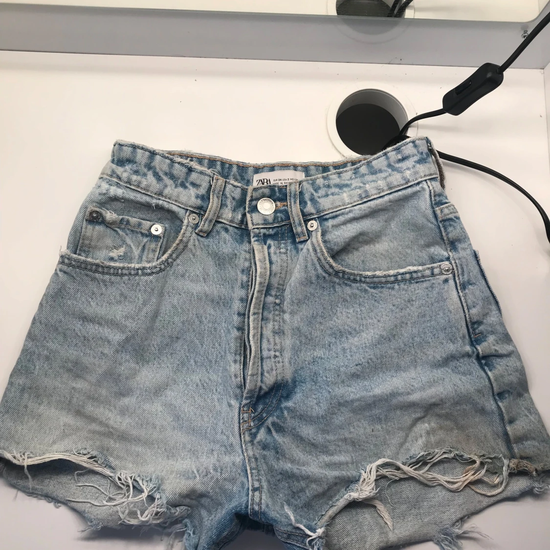 Högmidjade jeansshorts från Zara