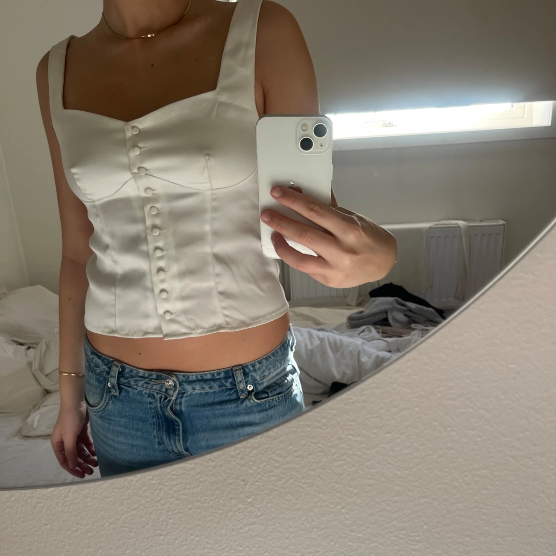 Vit korsettopp med knappar