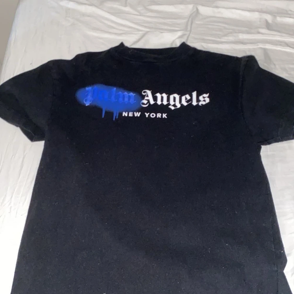 Svart t-shirt och tröja från Palm Angels