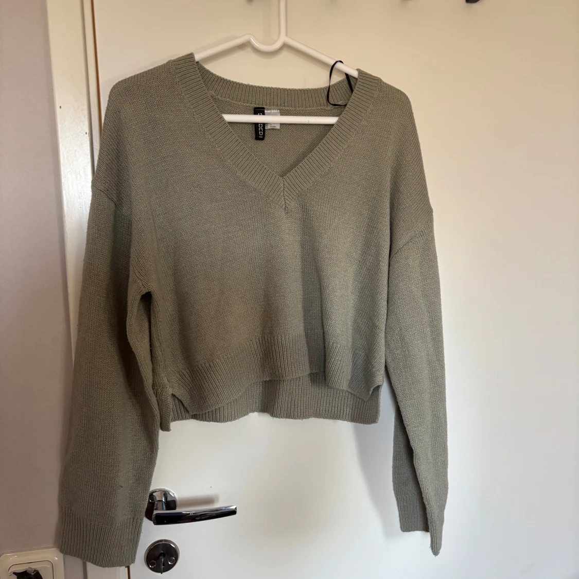 Grön croppad stickad tröja