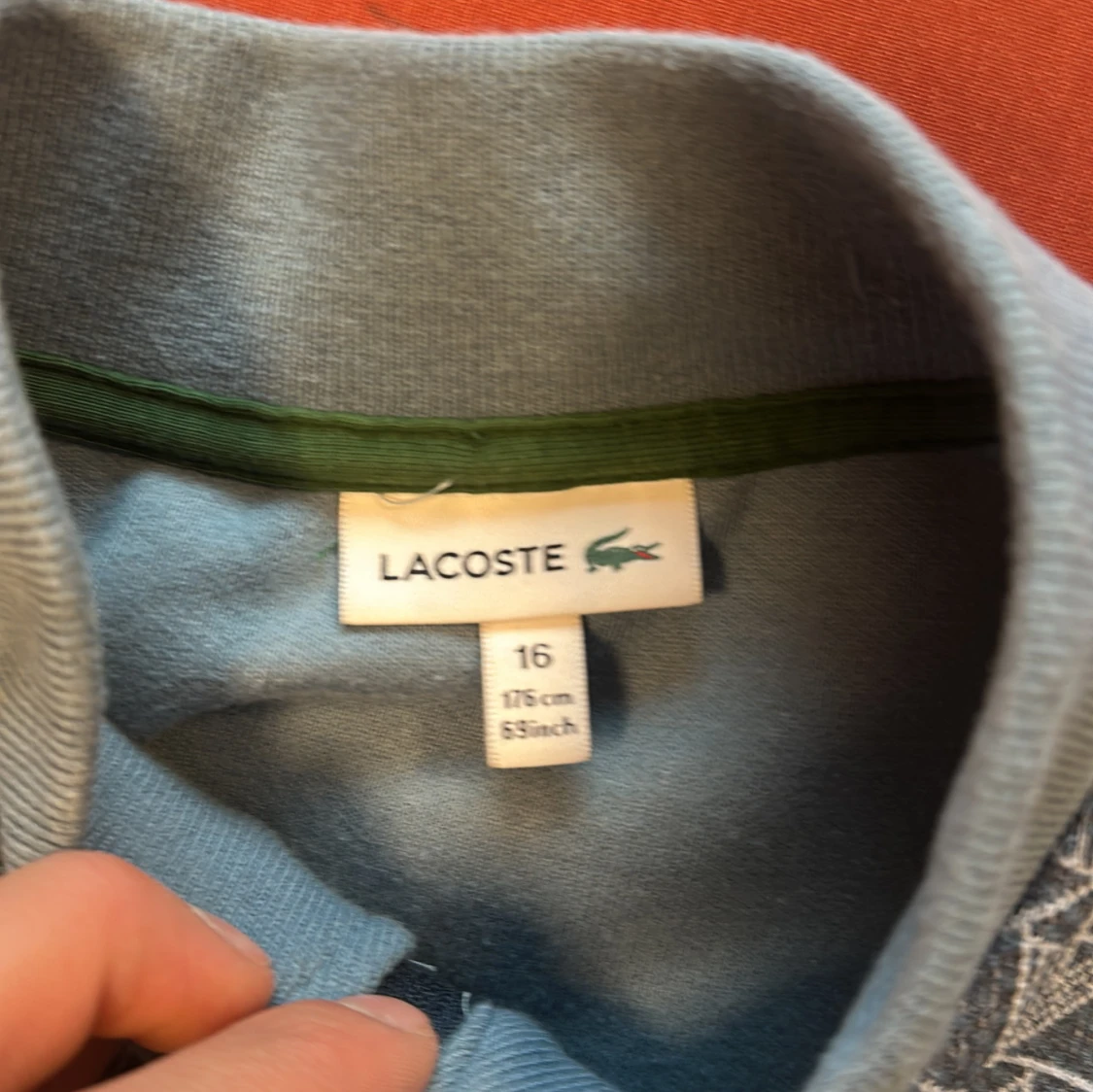 Blå mönstrad bomberjacka från Lacoste - 3