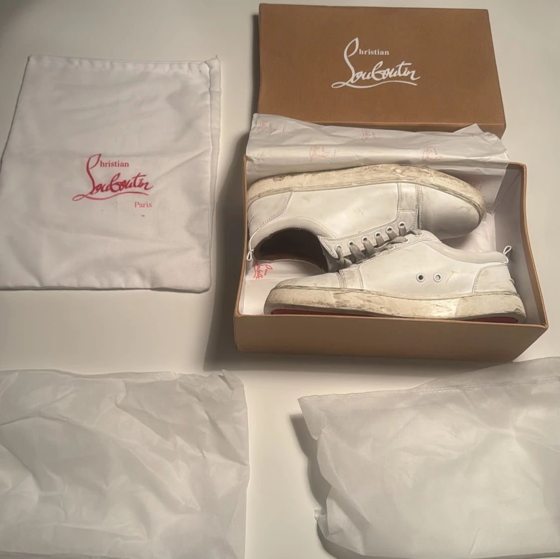 Vita sneakers från Christian Louboutin - 1
