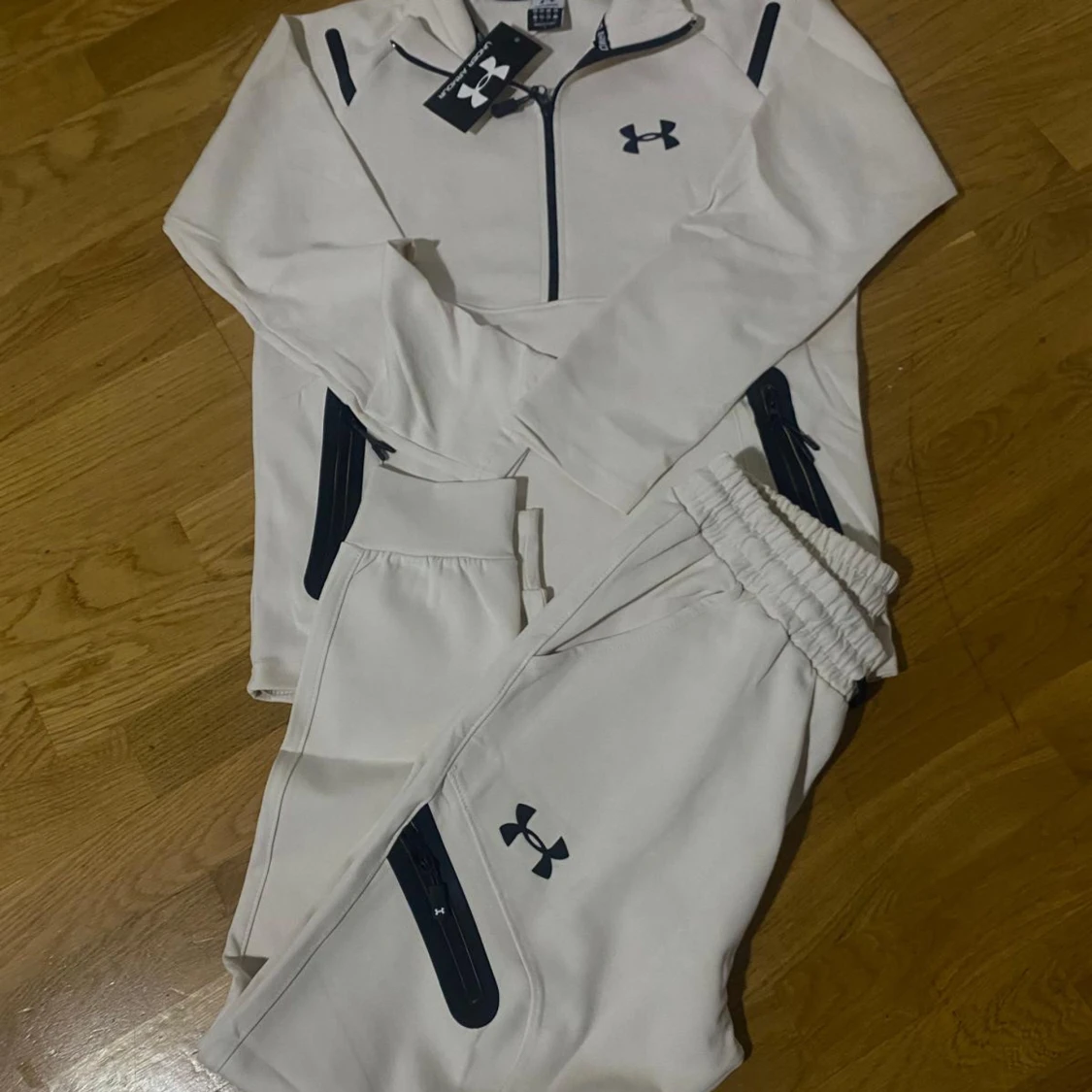 Vit half zip hoodie från Under Armour