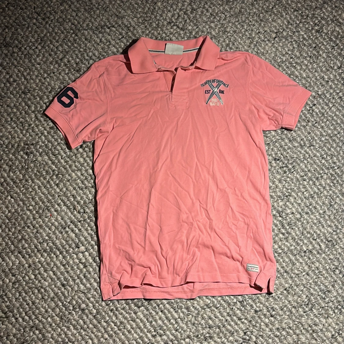 Rosa äldre Peak Performance piké M